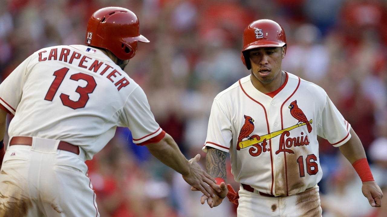 Wong helps Masterson win Cards debut with 9-7 victory over Brewers
